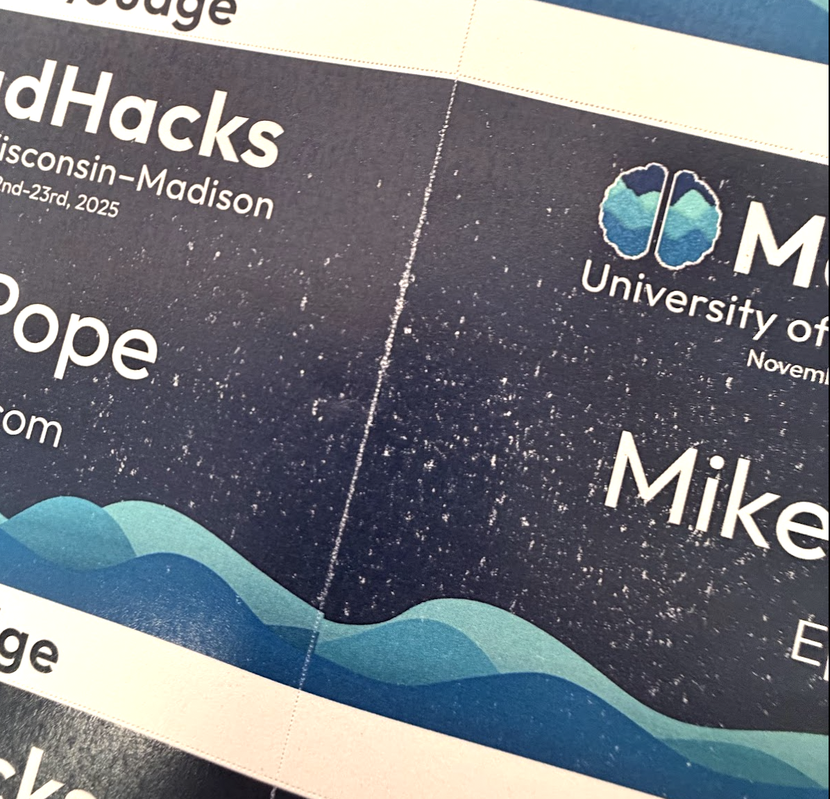 A close up of name tag paper with white artifacts