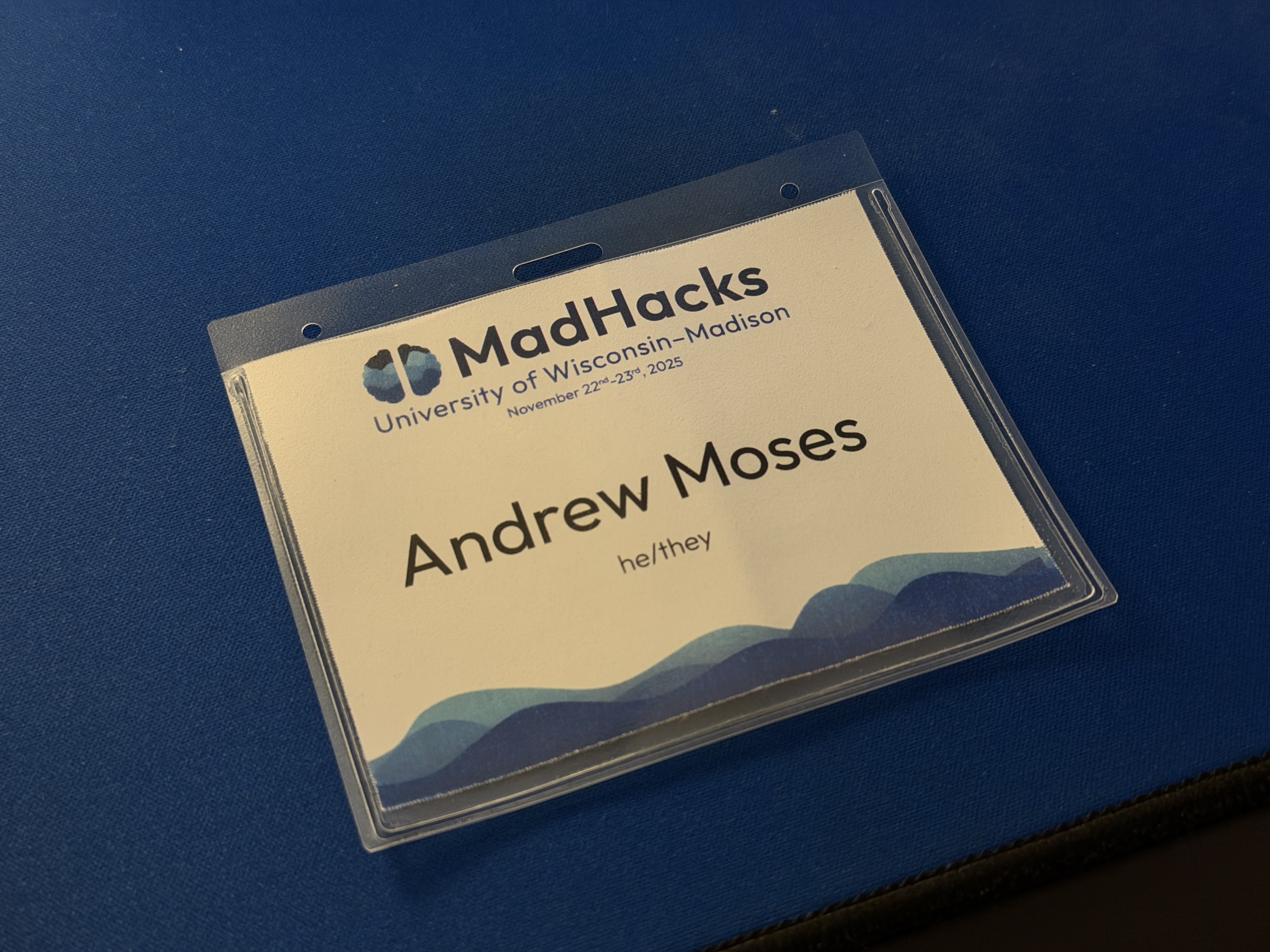 Front side of a name tag reading 'Madhacks 2025, Andrew Moses'