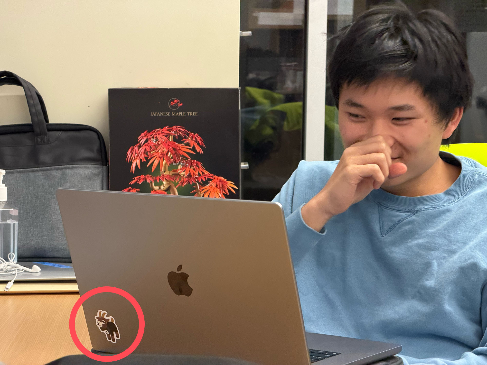 Goatpenguin sticker on Kev's laptop