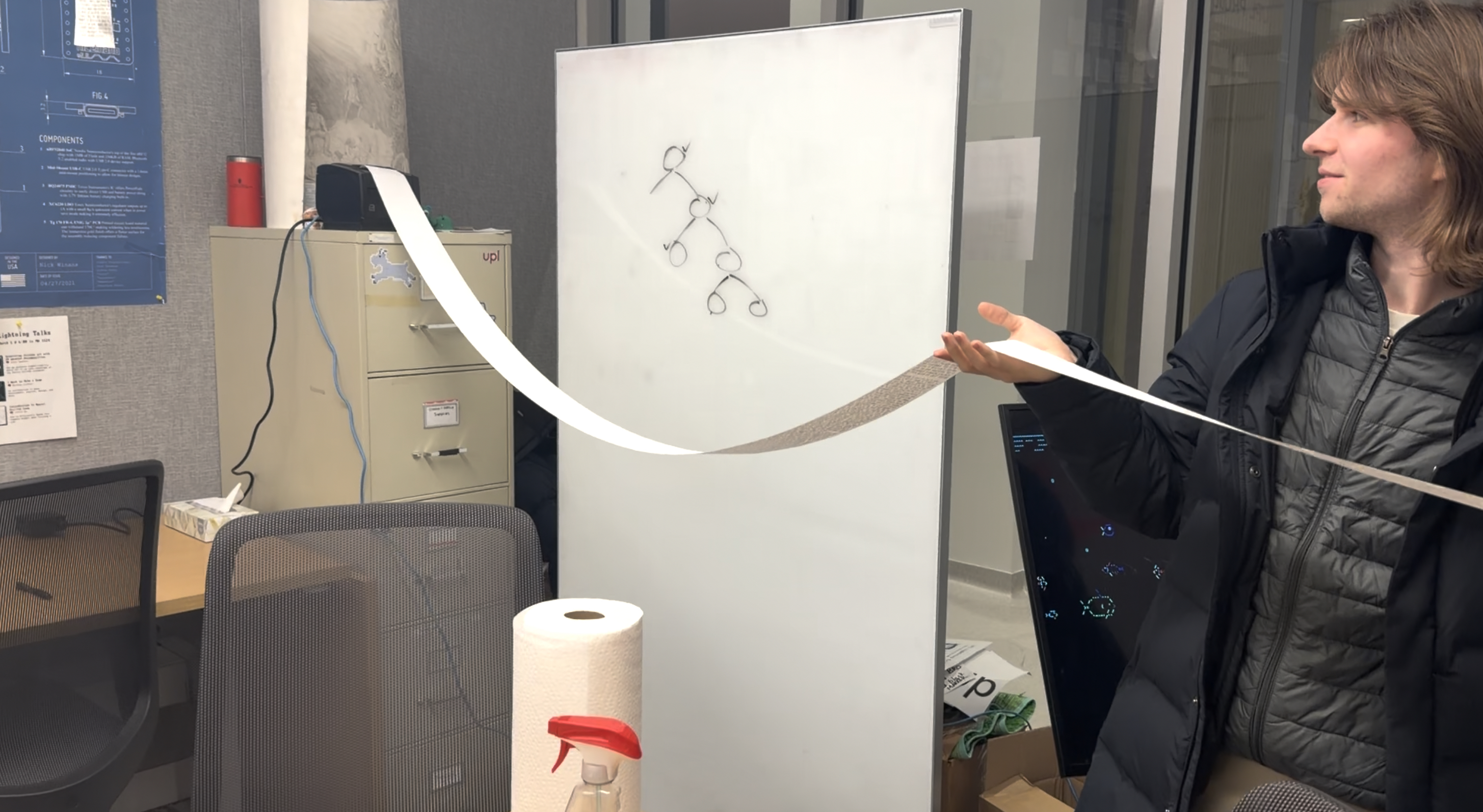 A very long receipt coming out of a receipt printer